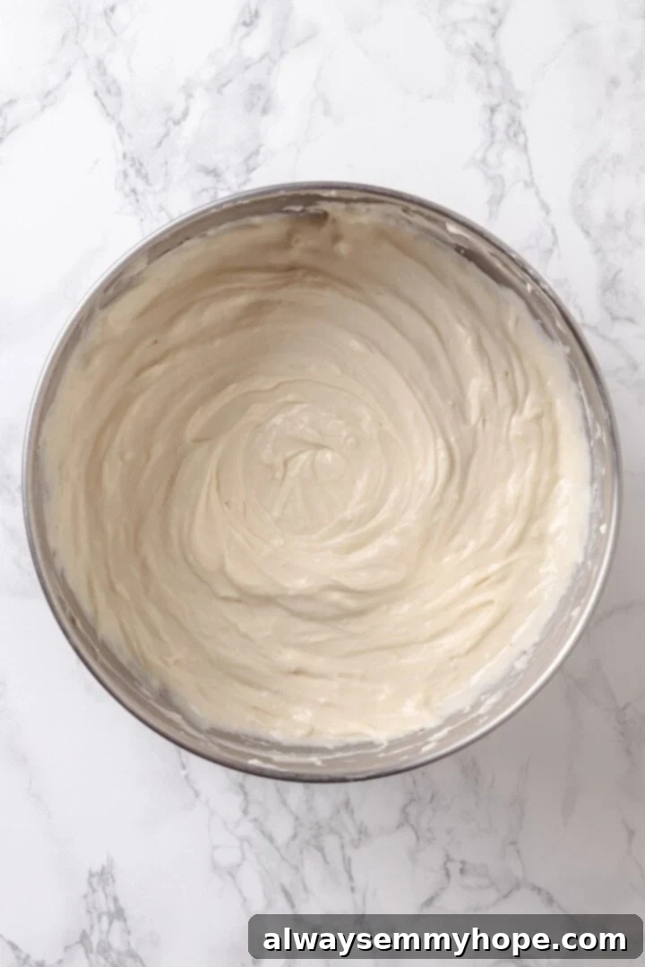 Vegan cheesecake mixture in mixing bowl