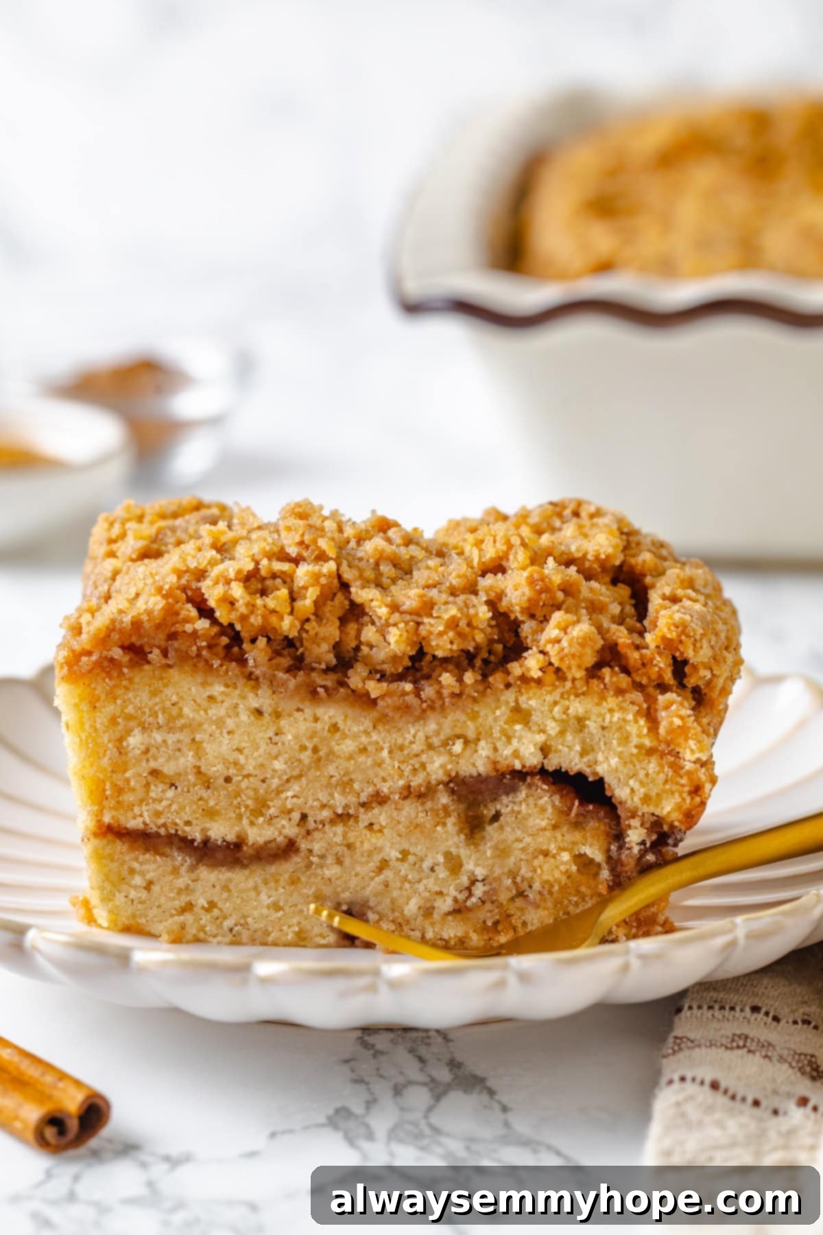 Vegan coffee cake on plate with fork.