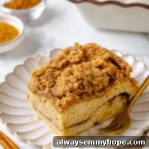 Slice of vegan coffee cake on plate with fork.