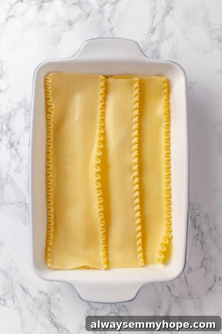 Lasagna noodles in a casserole dish.