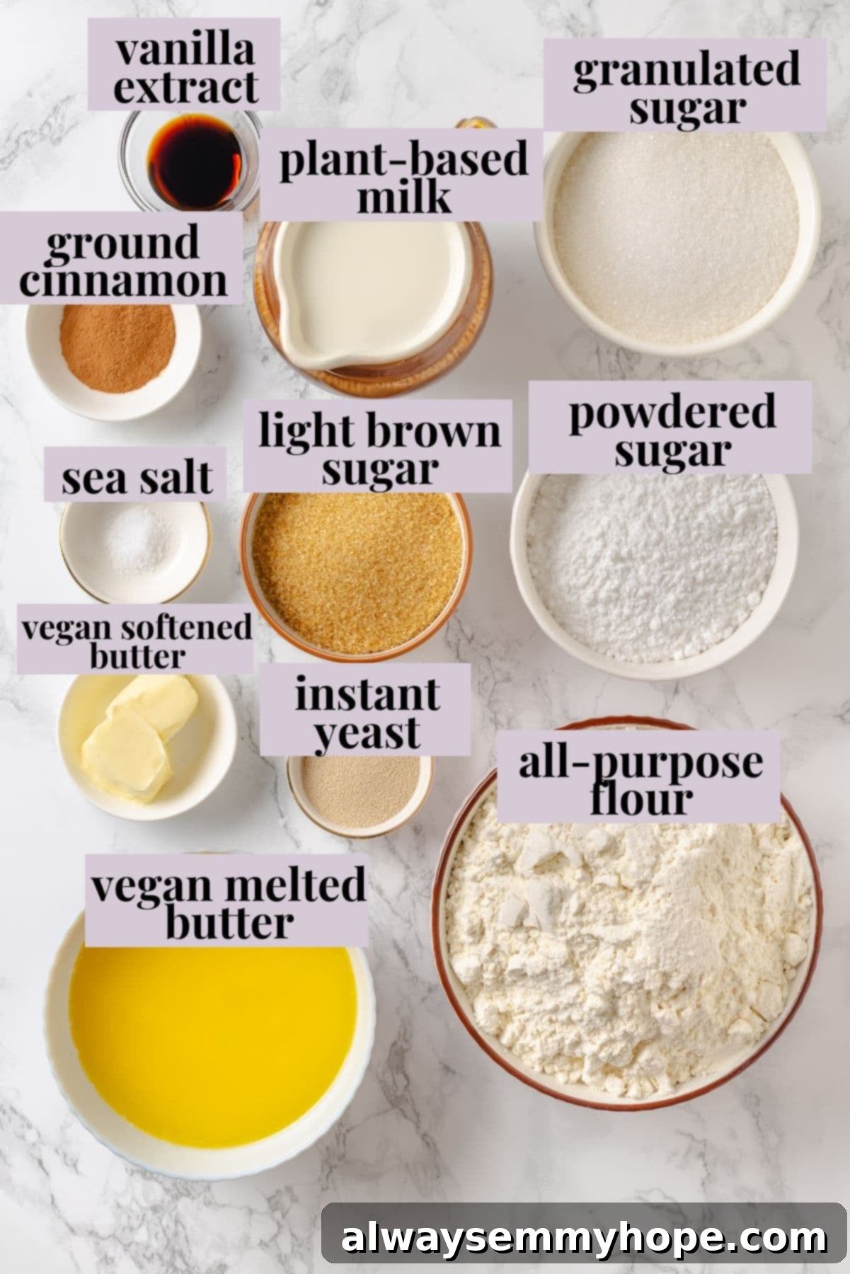 Ingredients for vegan monkey bread recipe, including flour, sugar, vegan butter, vegan milk, yeast, and cinnamon.