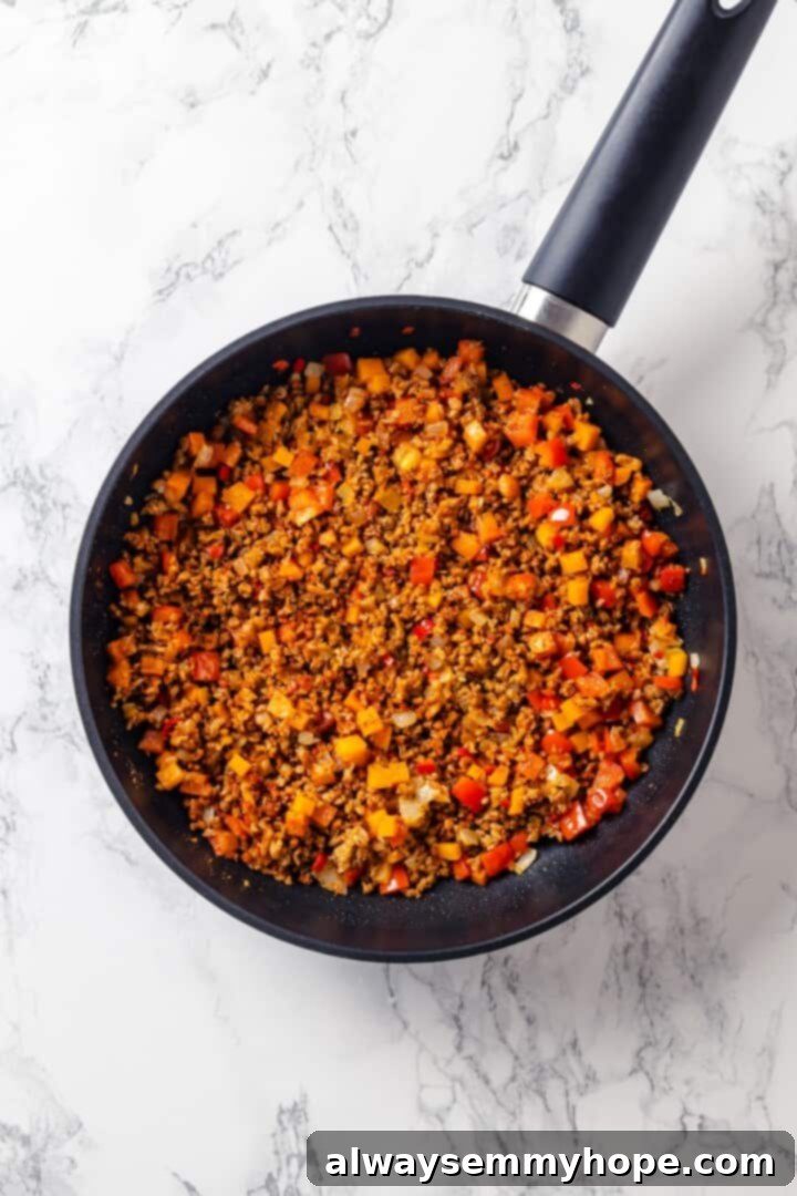 Vegan ground meat and veggies in pan