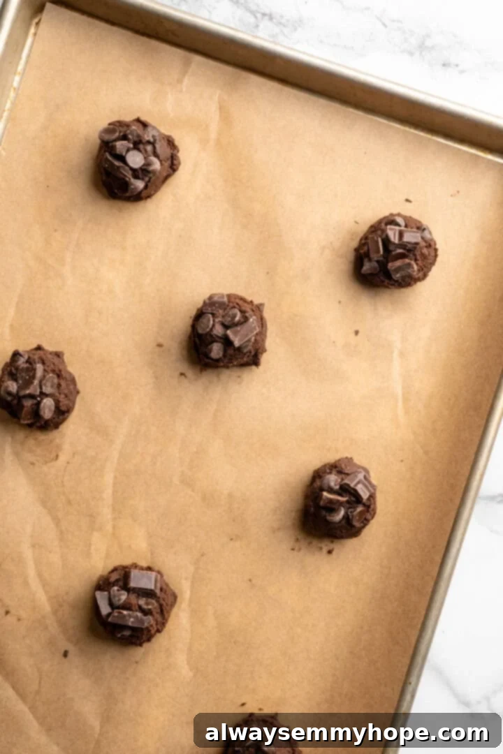 Dough for peppermint chocolate cookies on baking sheet.