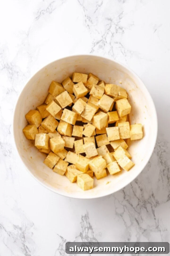 Seasoned tofu cubes in a bowl