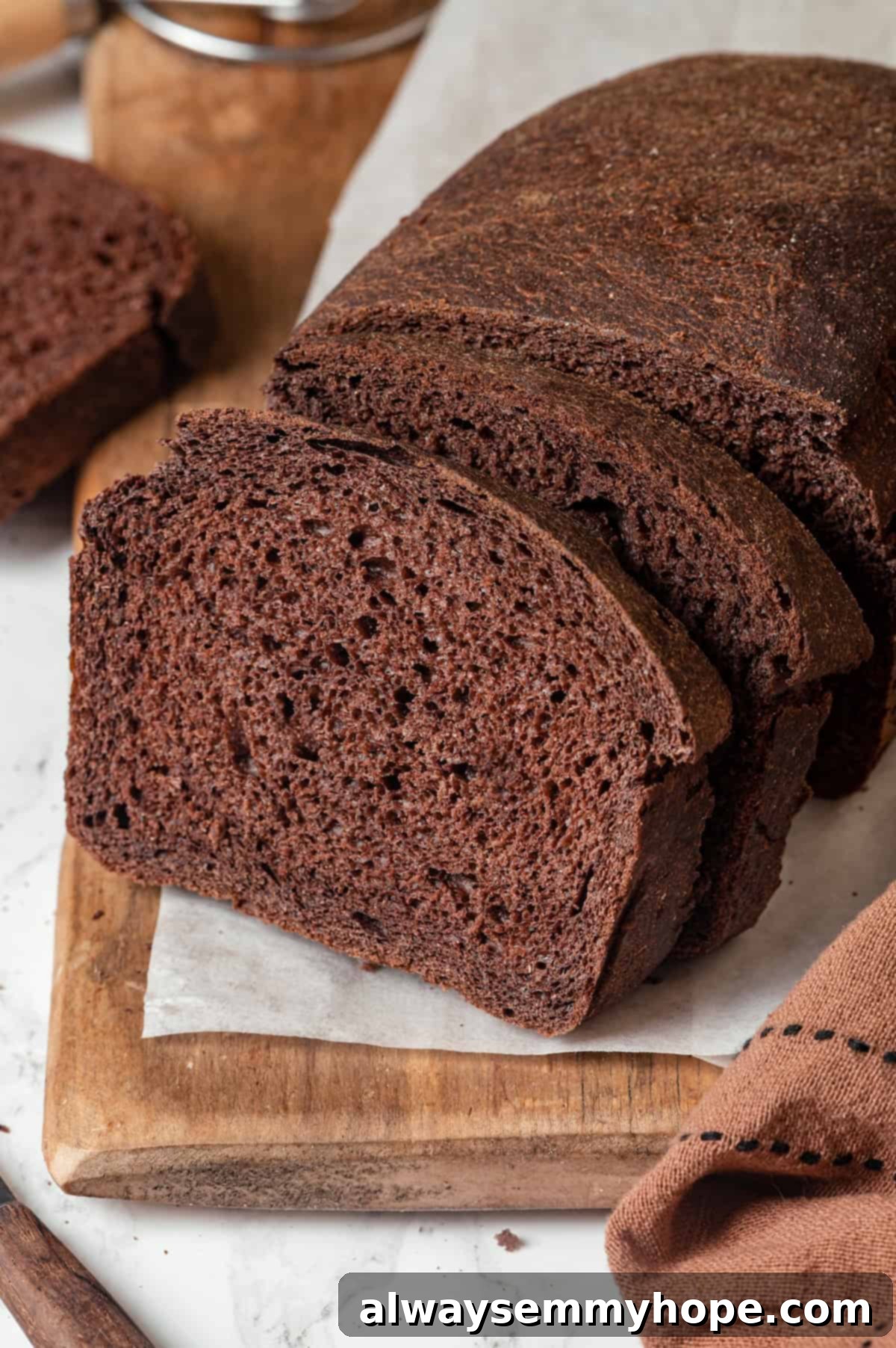 Pumpernickel Bread: A Deep Dive into Flavor and Tradition 8 Sliced loaf of homemade pumpernickel bread