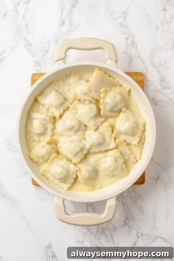 Mushroom Ravioli Delight 13 Skillet of vegan mushroom ravioli with creamy sauce.