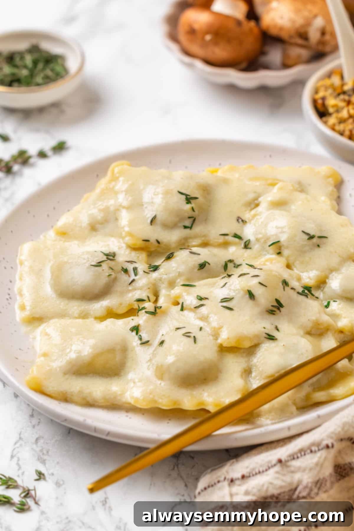 Mushroom Ravioli Delight 14 Plate of mushroom ravioli with fresh thyme.
