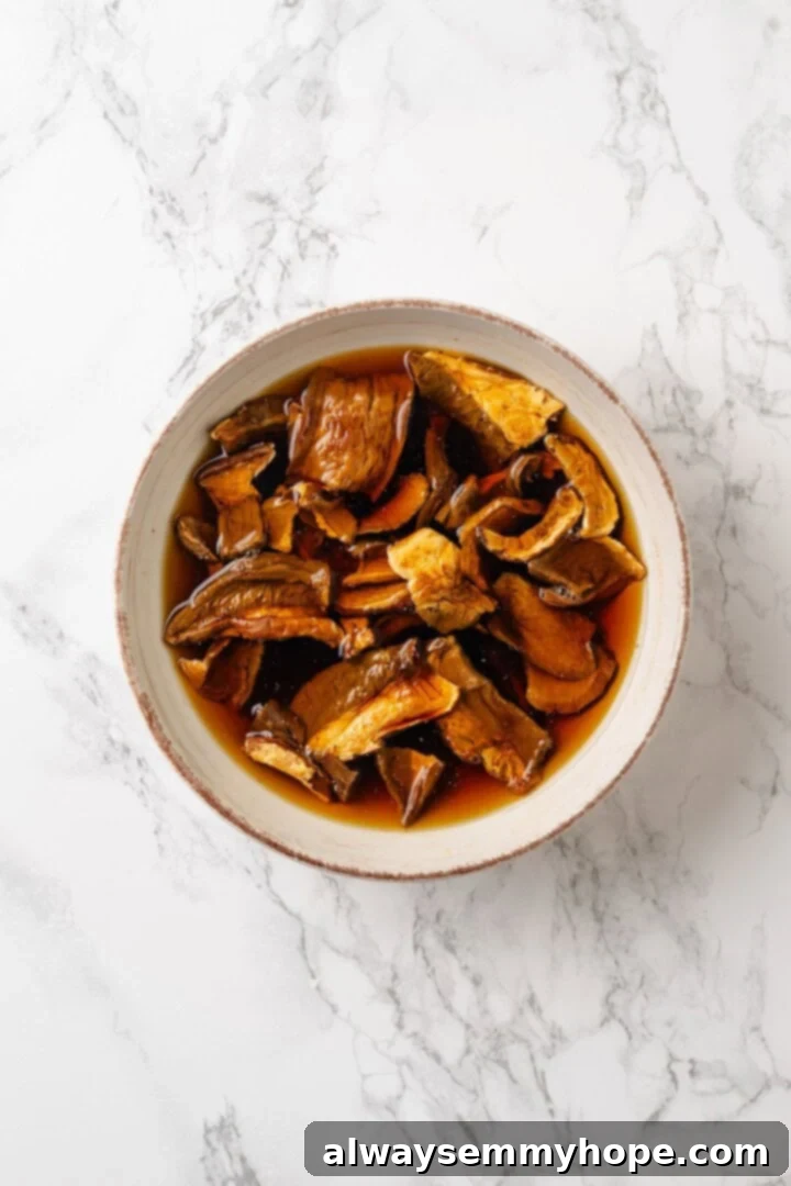 Mushroom Ravioli Delight 5 Porcini mushrooms in bowl with water.