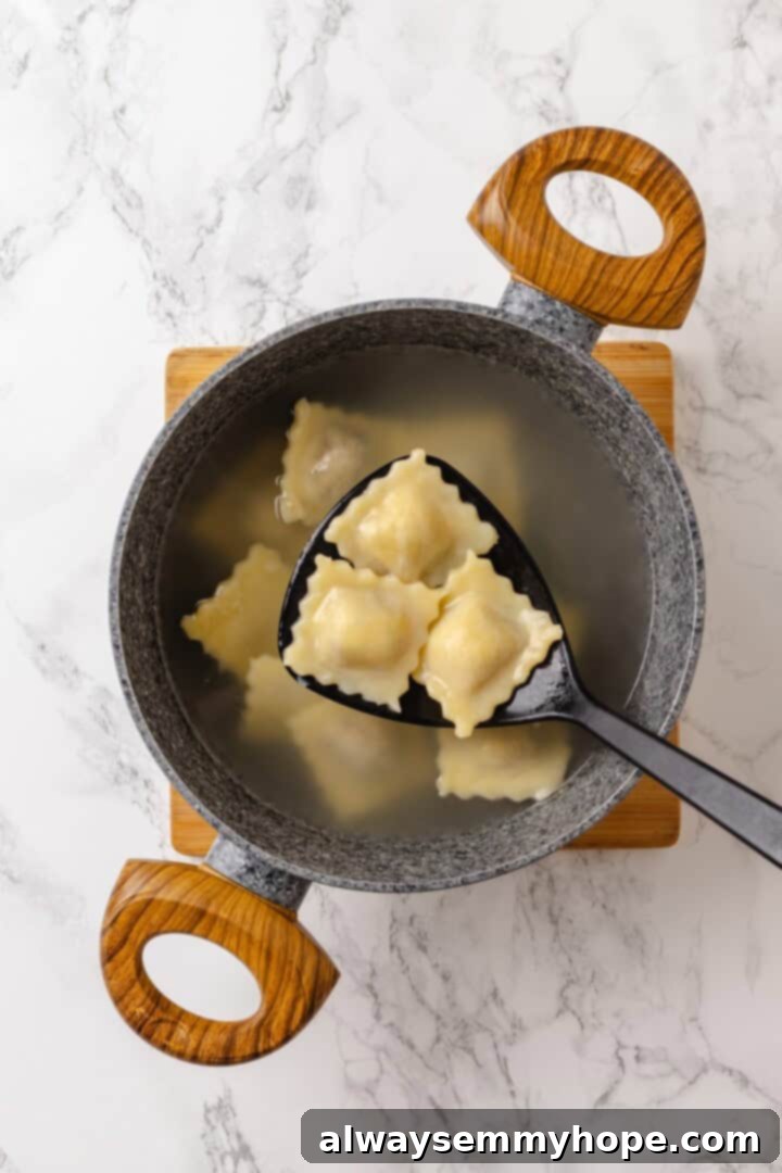 Mushroom Ravioli Delight 10 Lifting 3 mushroom ravioli from pot of water.