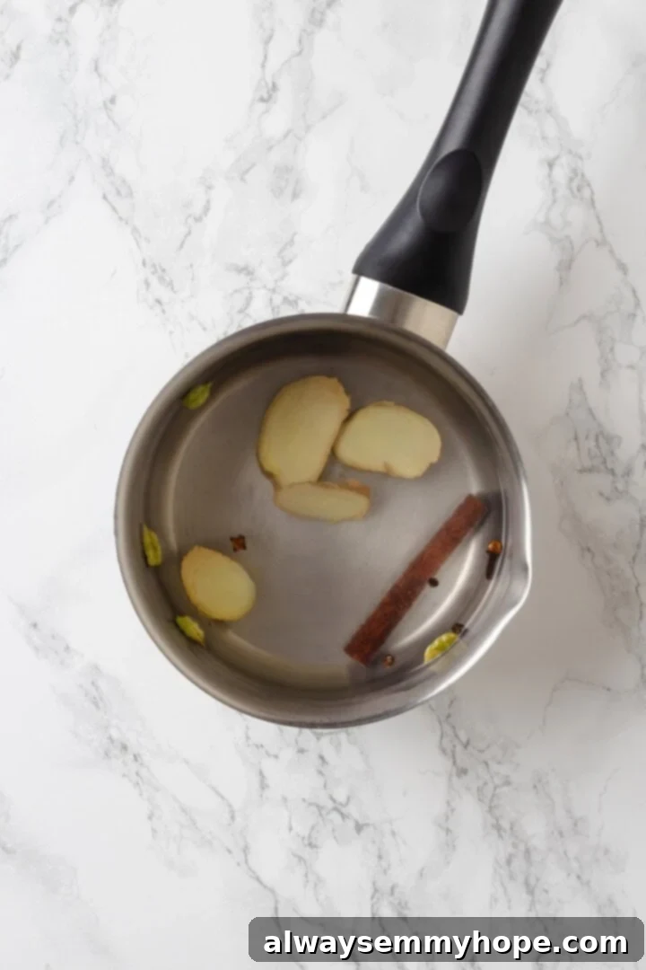 Spiced Chai Serenity 2 Spices in pot of water.