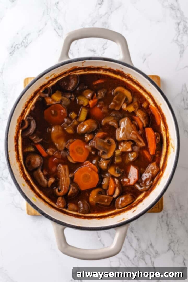 Simmering mushroom bourguignon Mushroom bourguignon simmering in a Dutch oven