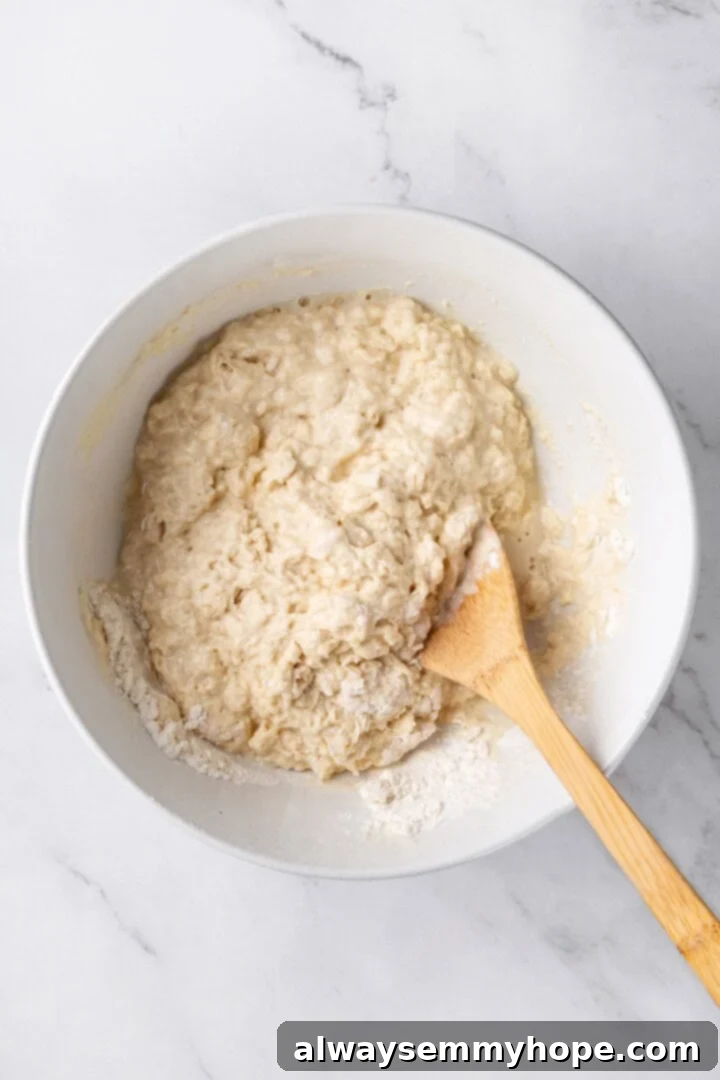Effortless Beer Bread: A Simple 6-Ingredient Recipe 5 Stirring beer into dry ingredients