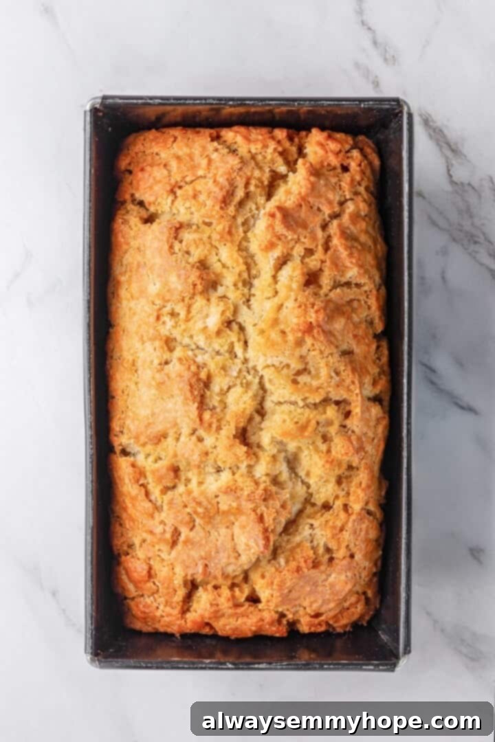 Effortless Beer Bread: A Simple 6-Ingredient Recipe 7 Golden brown beer bread after baking
