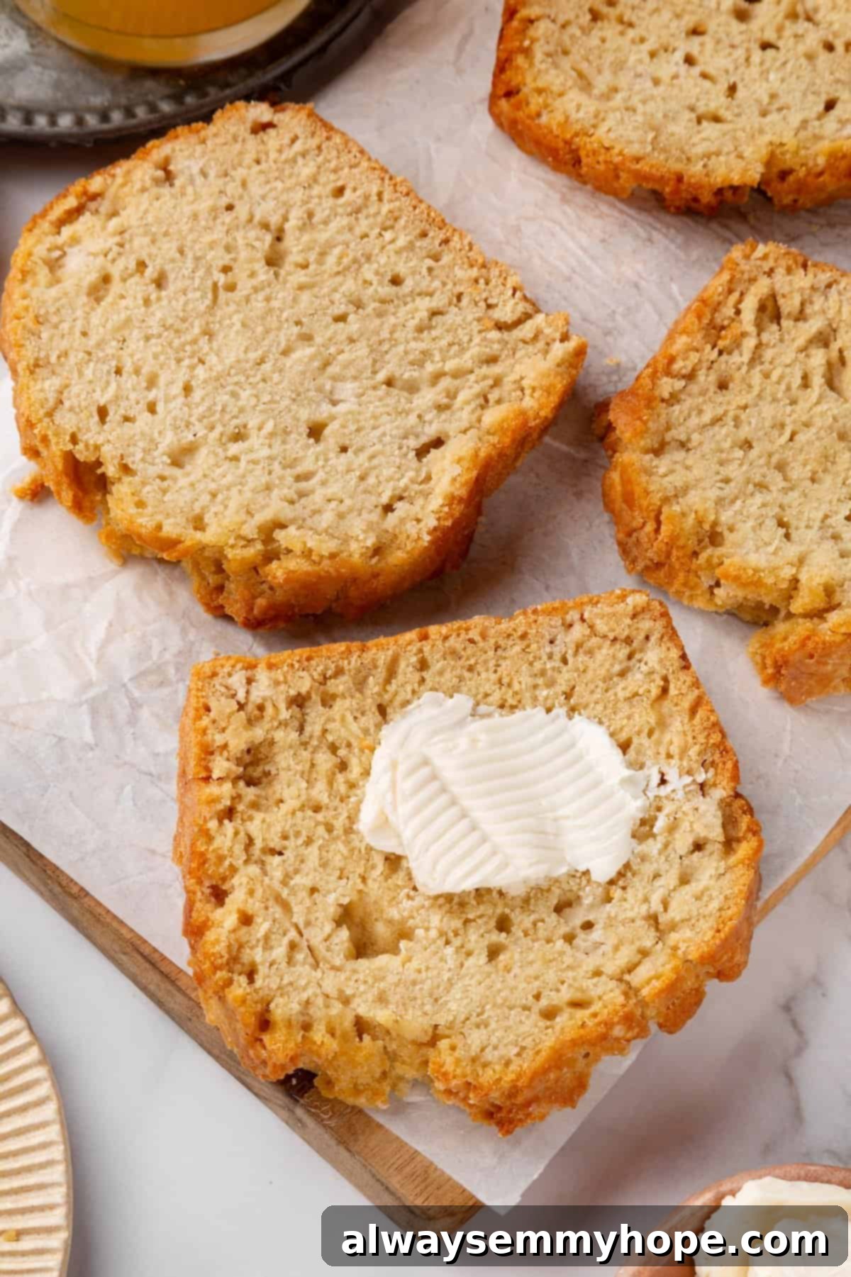 Effortless Beer Bread: A Simple 6-Ingredient Recipe 9 Slices of beer bread with vegan butter