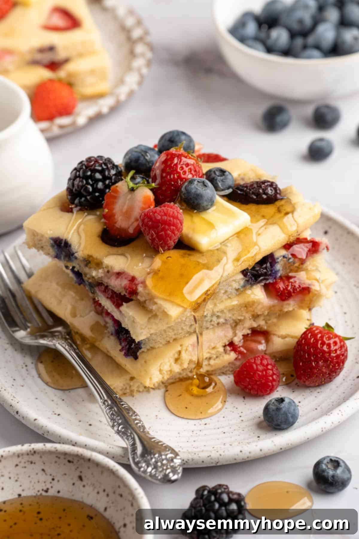Sheet pan pancake stack with berries and syrup Sheet pan pancake stack with berries and syrup
